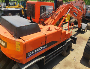 bager na kolesih Doosan DH140W