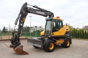 bager na kolesih Volvo EW140 D ROTOTILT STEELWRIST SYSTEM 2D SZCZYPCE SUPER STAN